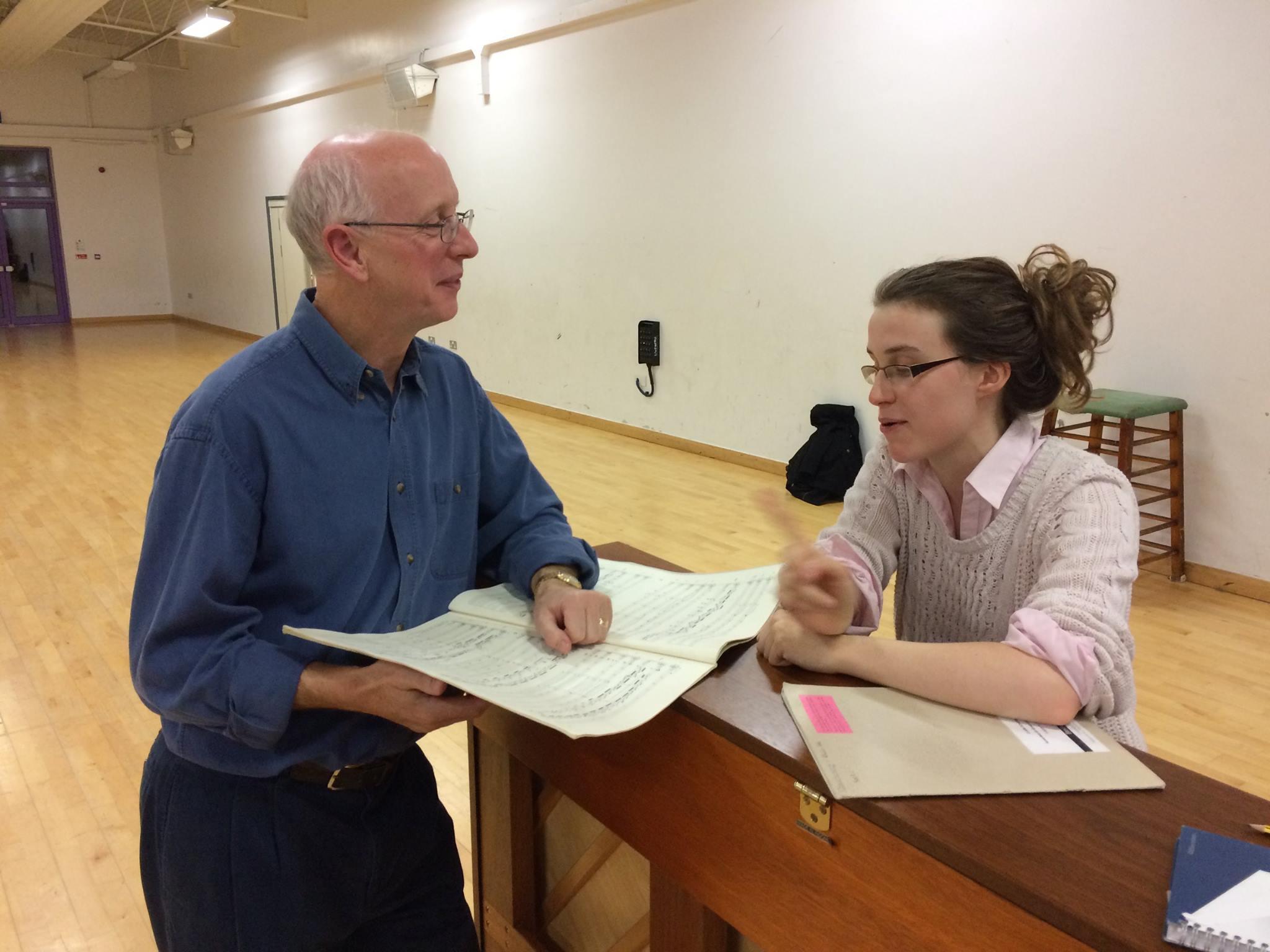 Andrew Lowen in discussion with soloist Katherine Tinker